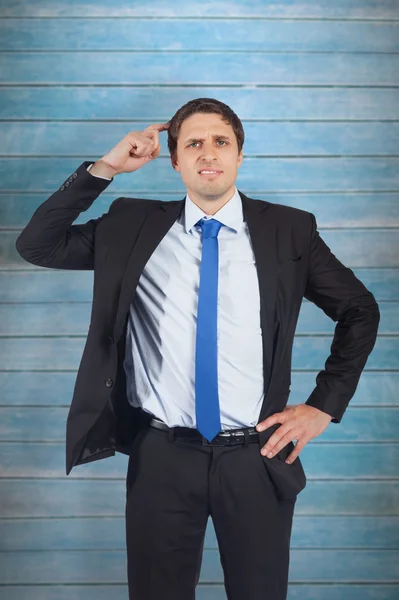 Thinking businessman scratching head — Stock Photo, Image