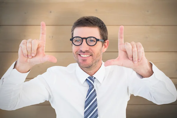 Businessman pointing with his fingers — Stock Photo, Image