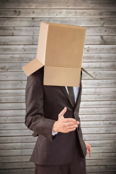 Anonymous businessman offering his hand — Stock Photo, Image