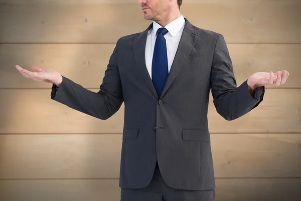 Businessman presenting with his hands — Stock Photo, Image