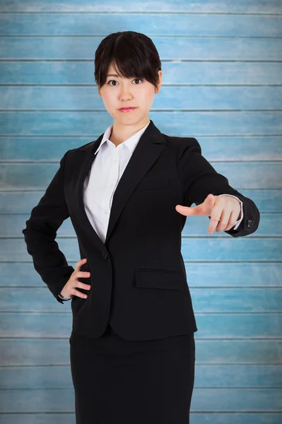 Focused businesswoman pointing — Stock Photo, Image