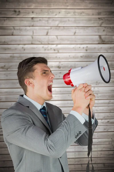 Hombre de negocios con megáfono — Foto de Stock