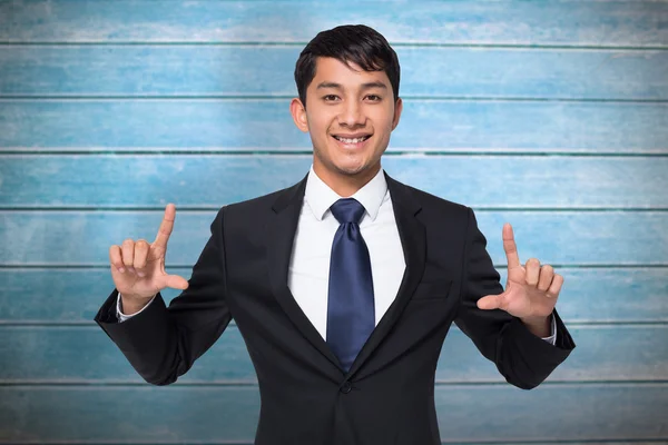 Smiling businessman holding — Stock Photo, Image
