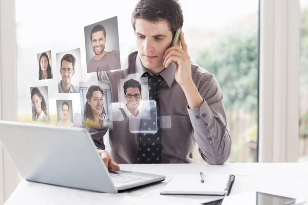 Affärsman på telefon och laptop — Stockfoto