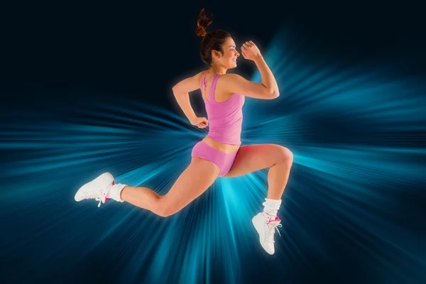 Fit brunette courir et sauter — Photo