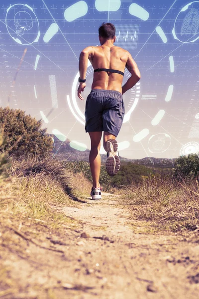 Mann som jogger med hjertemonitor – stockfoto
