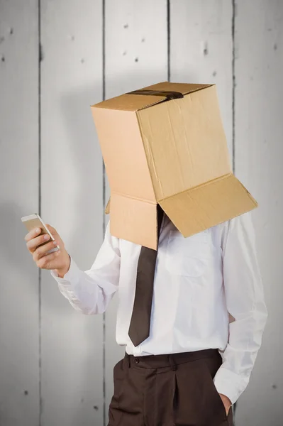 Anonymous businessman with his smartphone — Stock Photo, Image