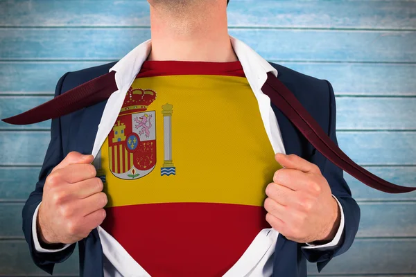 Businessman opening shirt to reveal spain flag — Stock Photo, Image