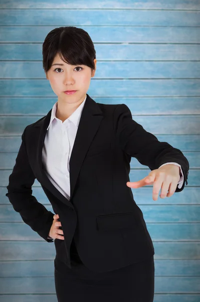 Focused businesswoman pointing — Stock Photo, Image