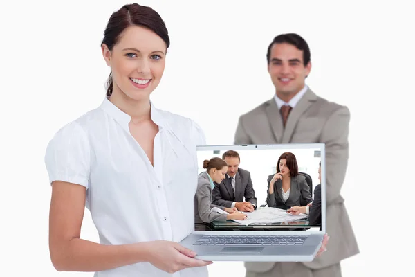 Four serious engineers looking at plans — Stock Photo, Image