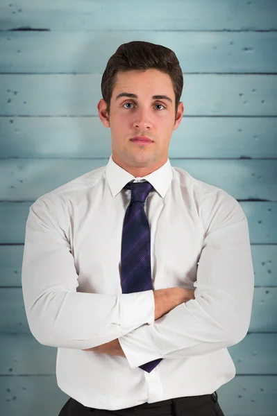 Businessman standing and looking at camera — Stock Photo, Image