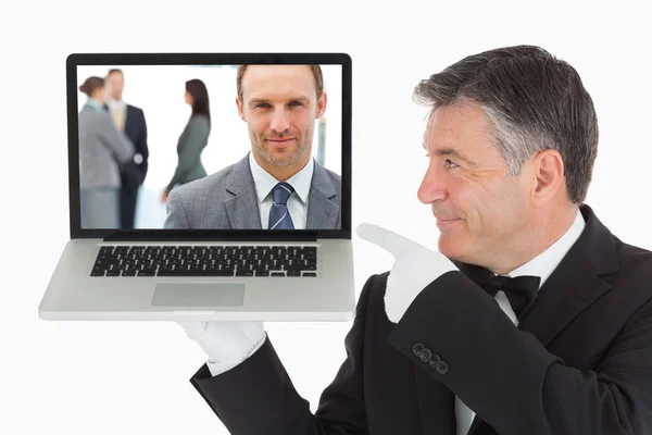 Proud manager posing in front of his team — Stock Photo, Image
