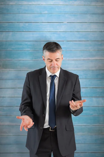 Businessman holding his hands out — Stock Photo, Image