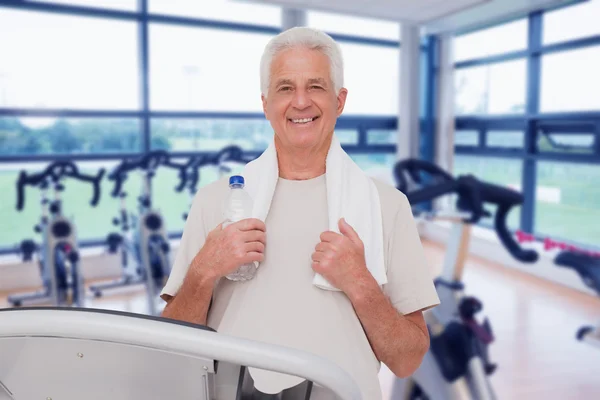 Senior man on the treadmill — Stock Photo, Image