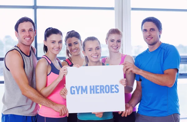 Gym helden tegen portret van een groep — Stockfoto