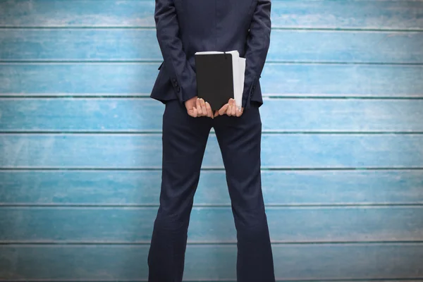 Businesswoman holding diary — Stock Photo, Image