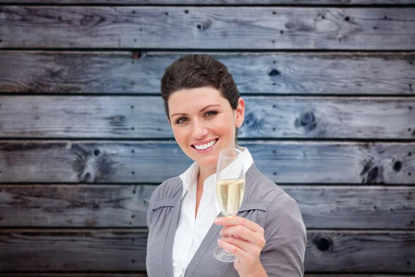 Businesswoman toasting with champagne — Stock Photo, Image