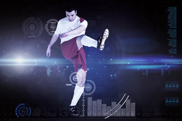 Giocatore di calcio in bianco calci — Foto Stock