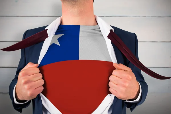 Businessman opening shirt to reveal chile flag — Stock Photo, Image