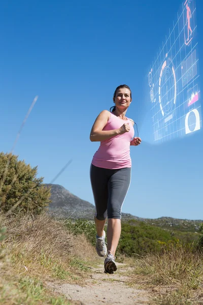 Kvinna jogging på landsbygden — Stockfoto