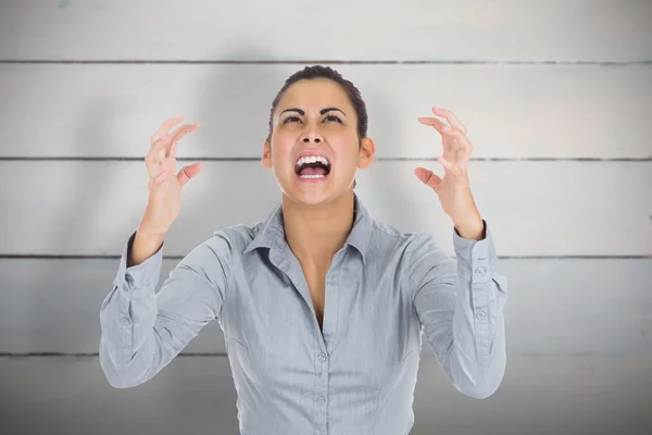 Furious businesswoman gesturing — Stock Photo, Image