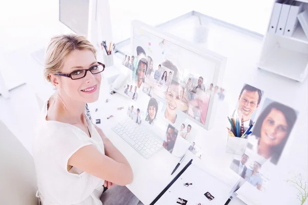 Creative team going over contact sheets — Stock Photo, Image