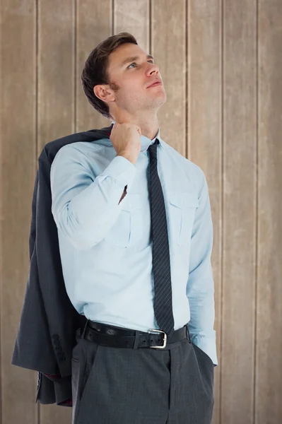 Vážný podnikatel drží jeho sako — Stock fotografie