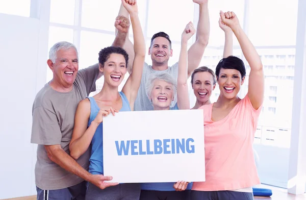 Wellbeing against portrait of happy fit people — Stock Photo, Image