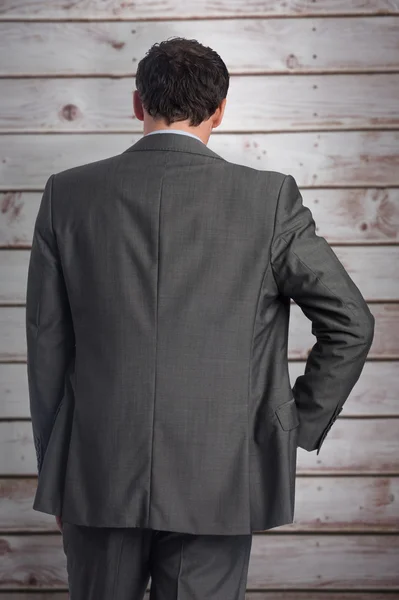 Businessman with hand on hip — Stock Photo, Image