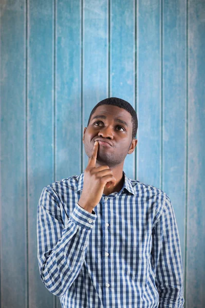 Young businessman thinking — Stock Photo, Image