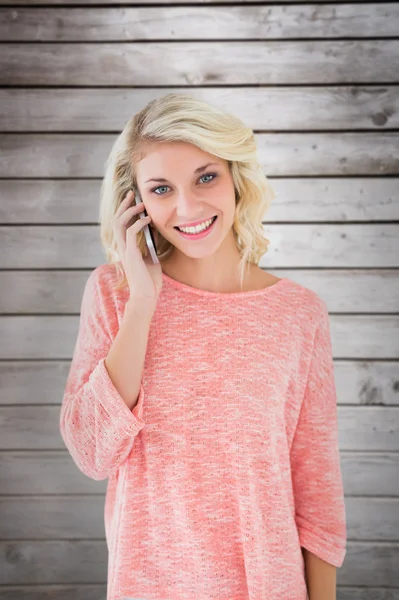 Blonde using her smartphone — Stock Photo, Image