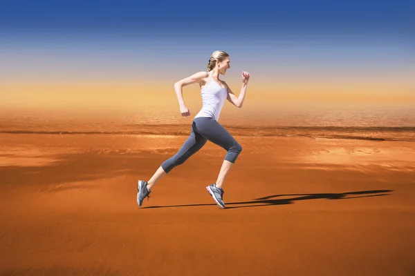 Muito ajuste jogging loira — Fotografia de Stock