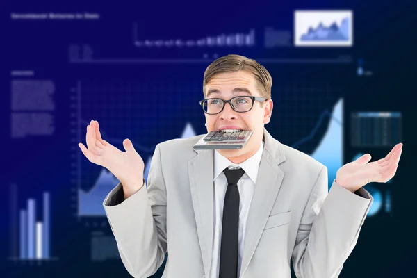 Geeky shrugging businessman biting calculator — Stock Photo, Image