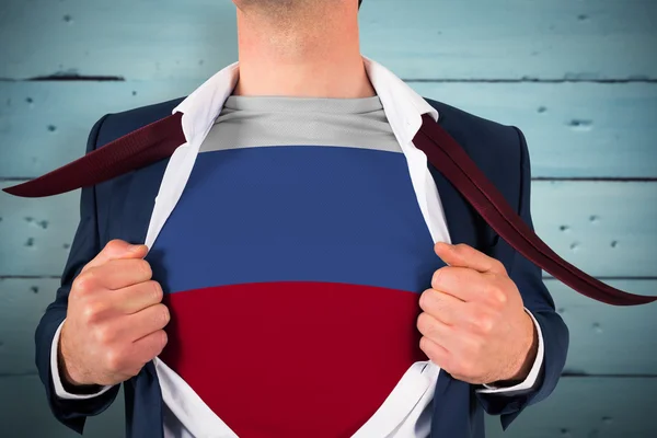 Camisa de apertura hombre de negocios para revelar bandera de Rusia — Foto de Stock