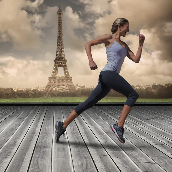 Imagem composta de jogging loira muito apto — Fotografia de Stock