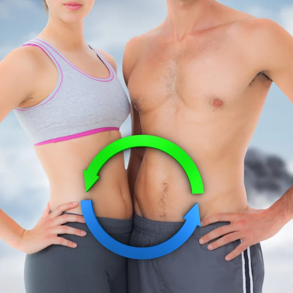 Mid section of a fit young couple — Stock Photo, Image