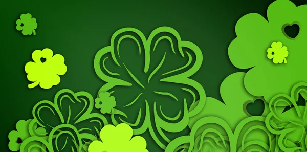 Green shamrocks on green background — Stock Photo, Image