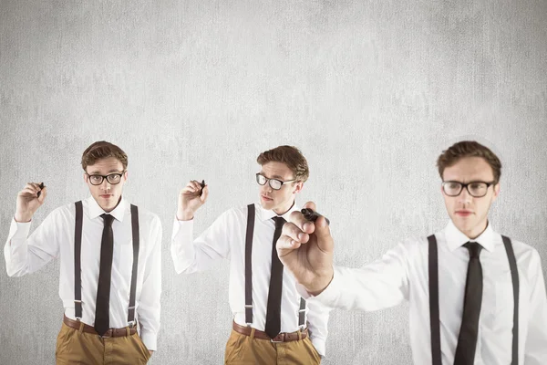 Imagen compuesta de la escritura nerd hombre de negocios — Foto de Stock