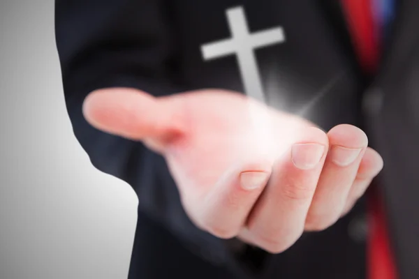 Composite image of businessman presenting with his hand — Stock Photo, Image