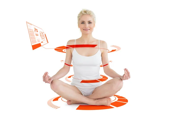 Toned young woman sitting in lotus pose — Stock Photo, Image