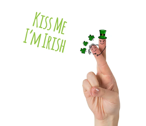 Composite image of patricks day fingers — Stock Photo, Image