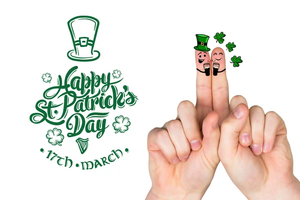 Composite image of patricks day fingers — Stock Photo, Image