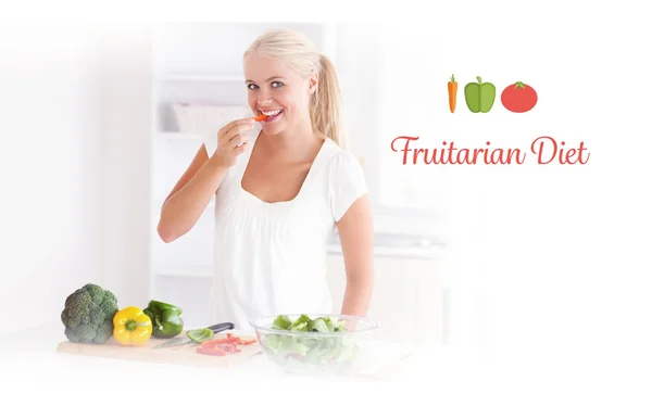 Fruitarian diet against woman eating pepper — Stock Photo, Image