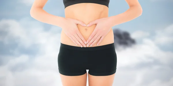 Closeup mid section of a fit woman — Stock Photo, Image