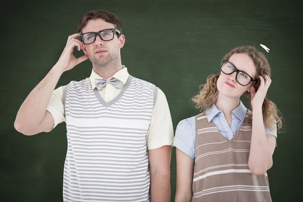 Geeky hipster couple thinking — Stock Photo, Image