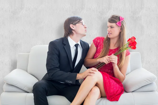 Composite image of cute geeky couple — Stock Photo, Image