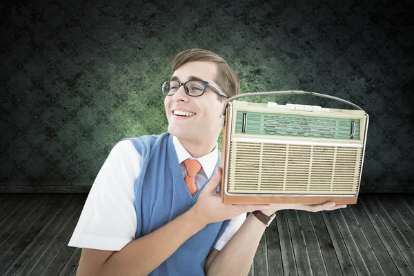 Geeky hipster listening to retro radio — Stock Photo, Image