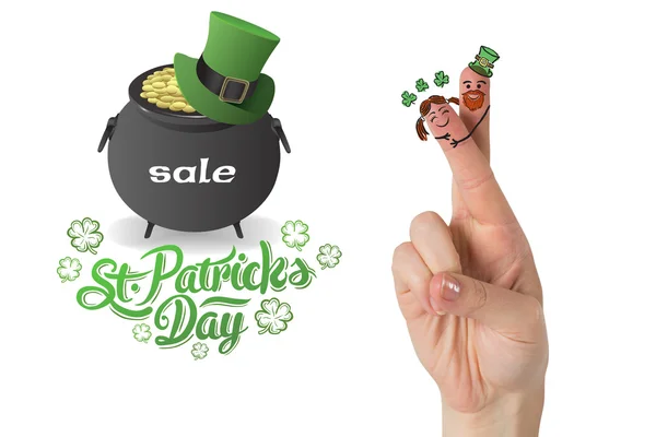 Composite image of patricks day fingers — Stock Photo, Image