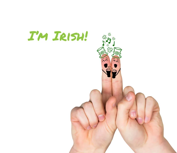 Composite image of patricks day fingers — Stock Photo, Image
