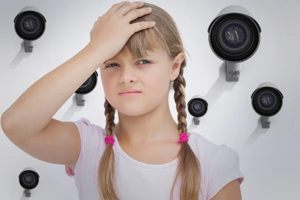 Little girl suffering from headache — Stock Photo, Image